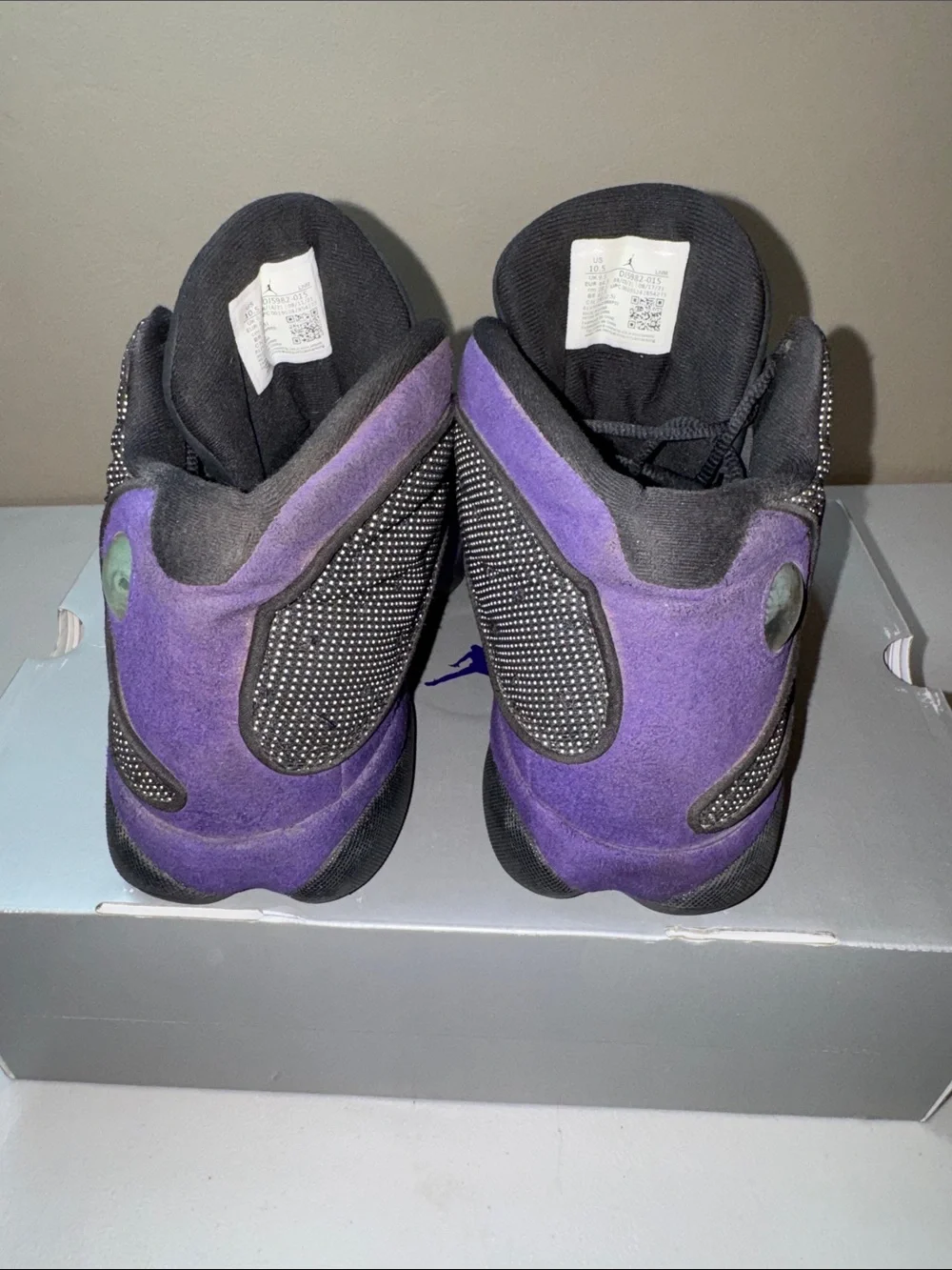 Jordan Retro High-Top Sneakers in Black and Purple